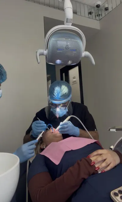 Me working on a patient in the clinic