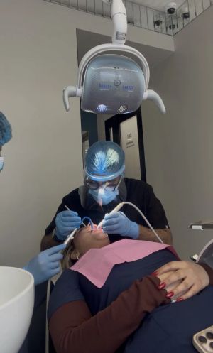 Me working on a patient in the clinic